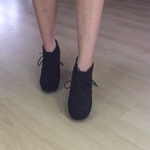 Black laced wedges. Never worn.